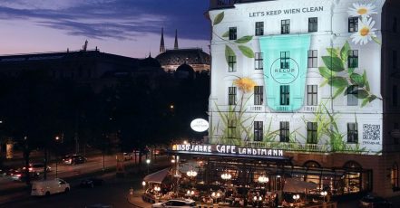 Let's keep Wien clean – RECUP Out-of-Home-Projektion auf der 300 qm großen Hauswand des Café Landtmann am Universitätsring in Wien (Bildquelle: movelight)
