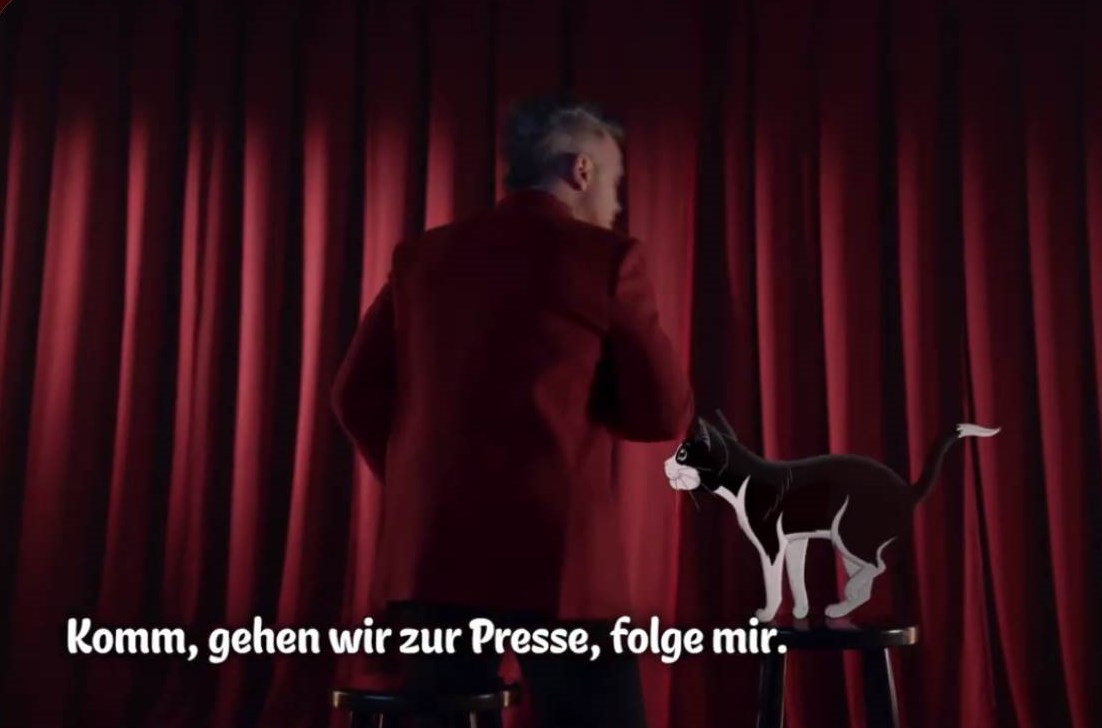 Screenshot (v. 25.01.2023) aus dem Musik-Video "Felix & Robbie – Zwei Legenden, eine Bühne!" | Quelle: Purina Website Felix und Robbie (FelixundRobbie.de)